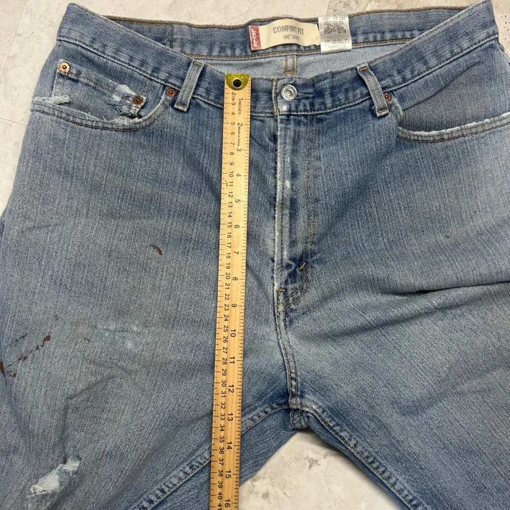 Levis 560 Comfort Fit Jeans Light Wash Mens W36 L30 Distressed Baggy Denim 0752